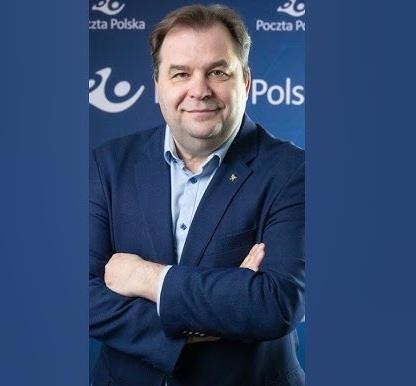 Sebastian Mikosz podczas spotkania biznesowego, symbolizującego jego rolę w restrukturyzacji PLL LOT.