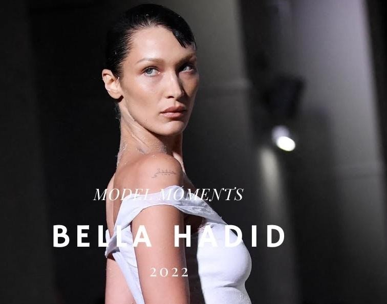 Alt: Bella Hadid na wybiegu podczas tygodnia mody, prezentująca awangardową stylizację z dynamiczną energią.